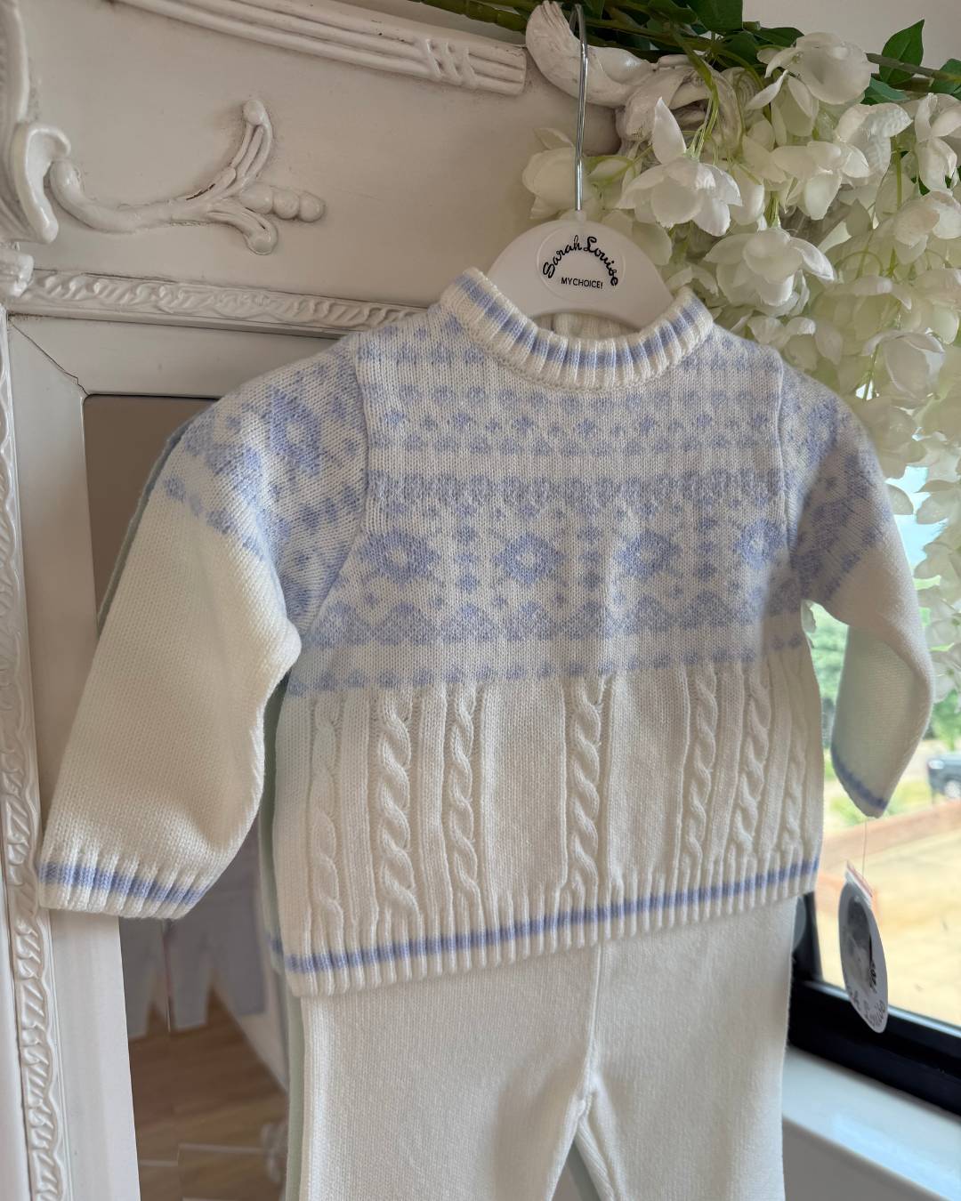 Sarah Louise Aspen ivory and baby blue knitted boys trouser set with Fair Isle pattern and cable knit detailing.