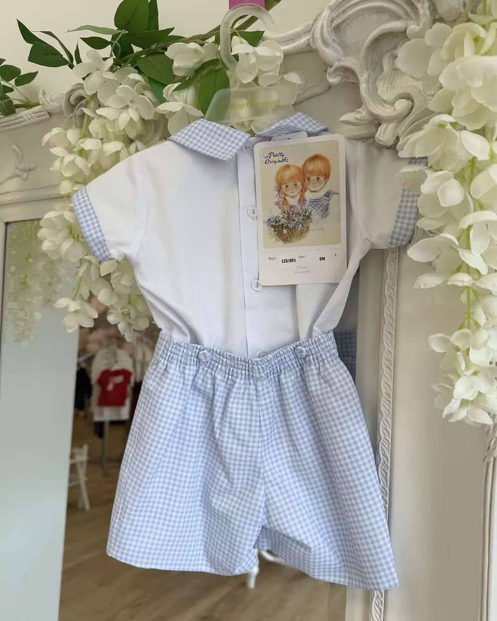 Pretty Originals Harry Gingham Short Set featuring blue and white gingham shorts, hand-smocked embroidered shirt and matching gingham trims.