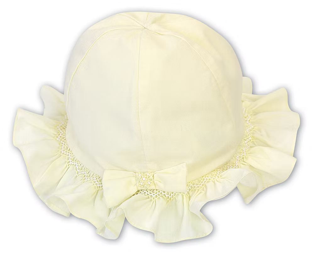 Sarah Louise Girls Sun Hat featuring hand-smocked trim, bow detail and a classic design. Available in white, pink and lemon.