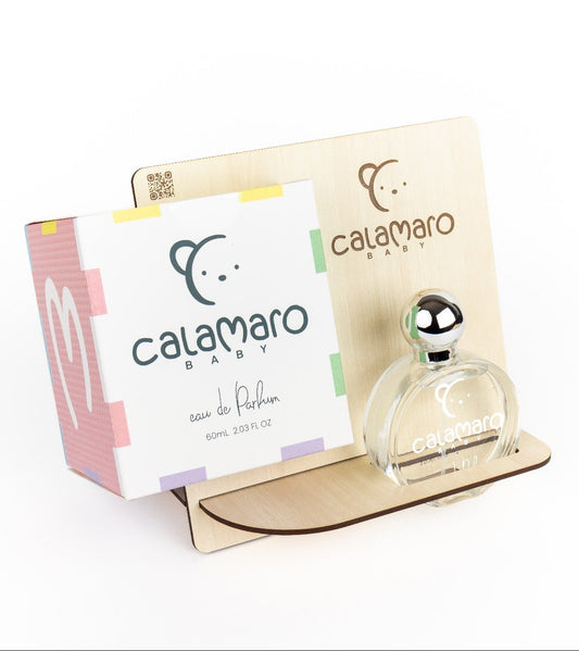 Calamaro Baby Eau de Parfum 60ml in a clear glass perfume bottle with silver lid, presented alongside colourful Calamaro gift packaging.