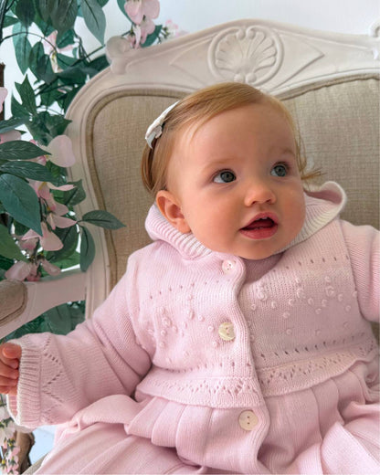 Sarah Louise Adeline pink double knit girls coat with hood, embroidered detailing, button fastening and pleated skirt.