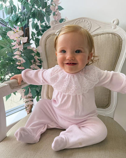 Bluesbaby Elodie Lace Velour Babygrow in baby pink with white lace frill collar, velvet bow and matching pink baby hat.