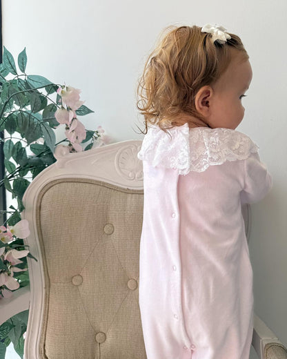 Bluesbaby Elodie Lace Velour Babygrow in baby pink with white lace frill collar, velvet bow and matching pink baby hat.