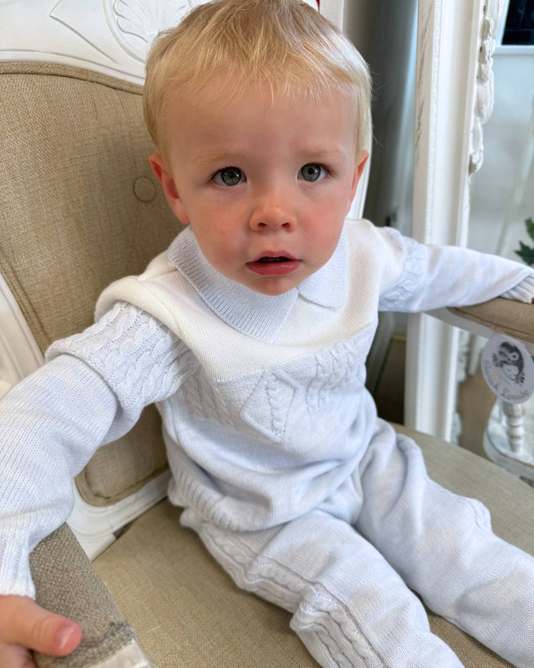 Sarah Louise Alfie baby blue and ivory boys knitted trouser set with cable knit detailing and collar.