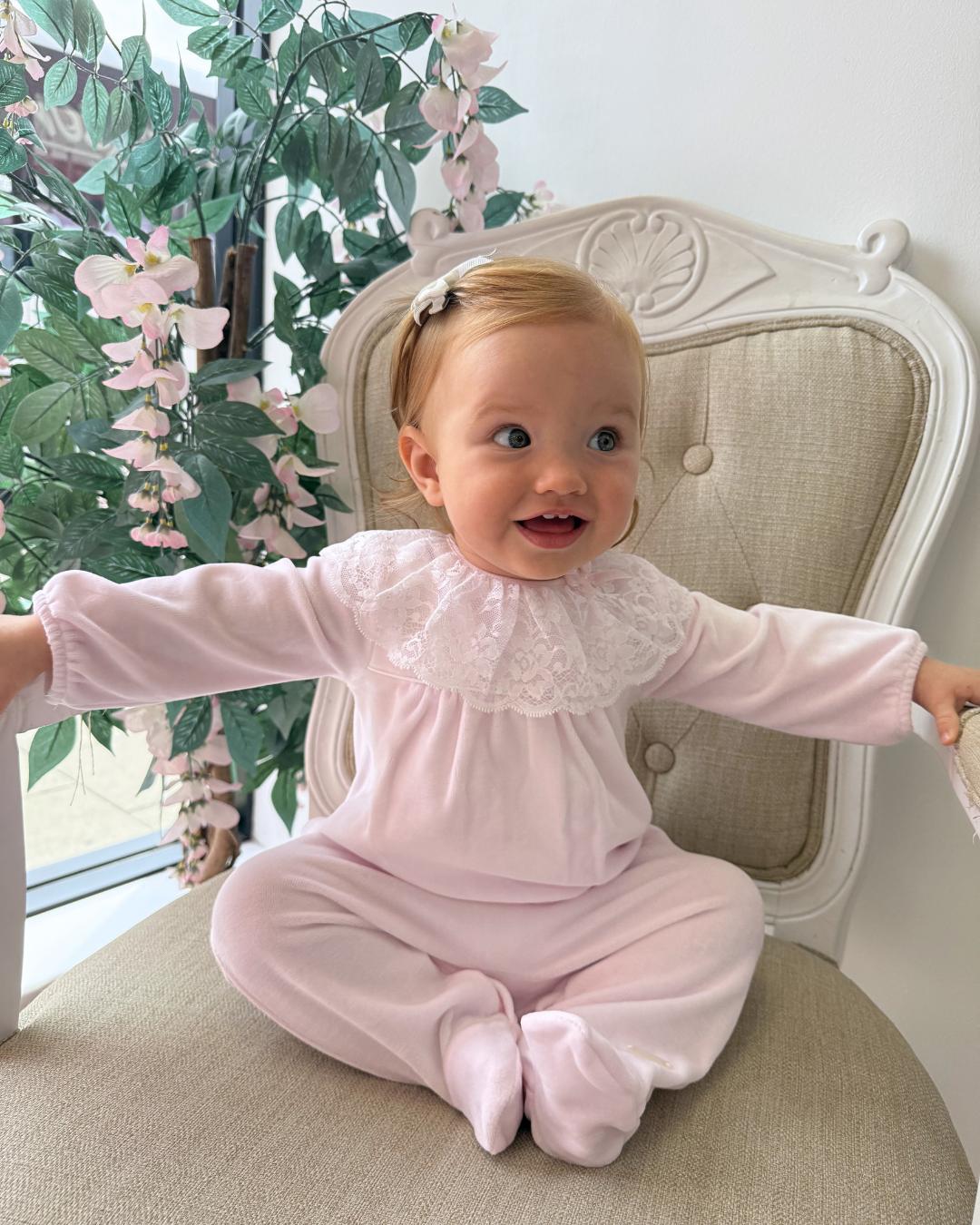 Bluesbaby Elodie Lace Velour Babygrow in baby pink with white lace frill collar, velvet bow and matching pink baby hat.
