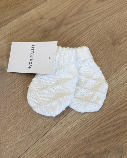 Little Nosh Hopscotch baby winter mittens with patterned knit and ribbed cuffs, available in white, biscuit brown and soft blue.