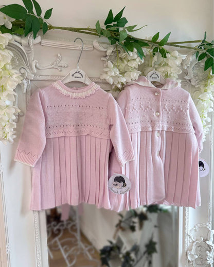 Sarah Louise Adeline pink knitted girls dress with ivory frill collar, hand embroidered roses and pleated skirt.