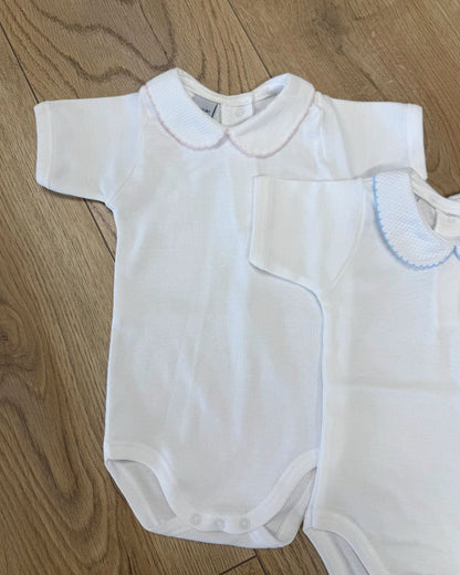Babidu white unisex baby bodysuit with Peter Pan collar and coloured stitch trim.