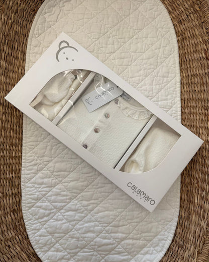 Calamaro Pearl ivory newborn baby girl gift set featuring a lace collar button-up top, matching footed trousers, baby mittens, hat and Calamaro signature baby perfume.