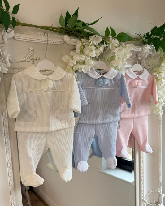 Baby knitted pom pom top and footed trouser set in ivory, baby blue and baby pink.