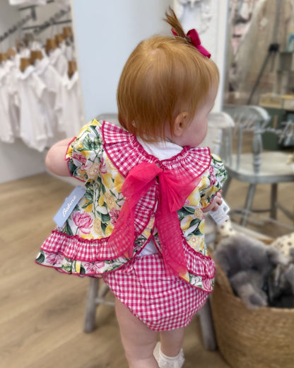 Babine Lemon Blossom Swing Back Dress & Pants featuring a lemon and pink floral print, open swing back, large tulle bow, frill collar, and matching pink gingham pants.