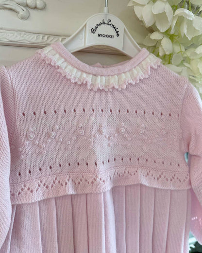 Sarah Louise Adeline pink knitted girls dress with ivory frill collar, hand embroidered roses and pleated skirt.