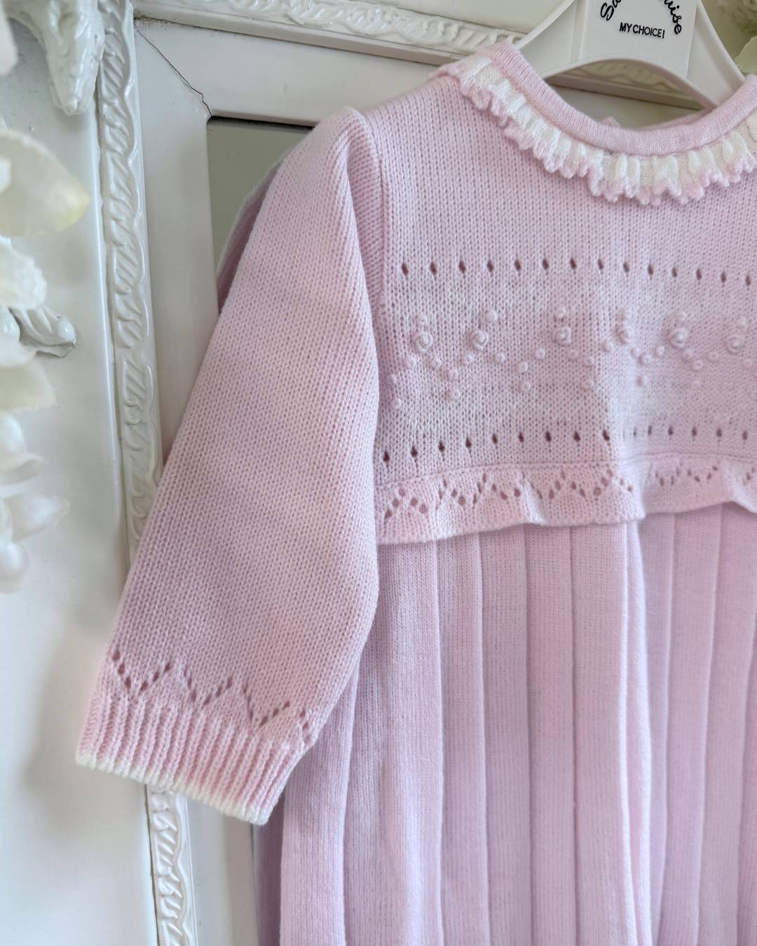 Sarah Louise Adeline pink knitted girls dress with ivory frill collar, hand embroidered roses and pleated skirt.