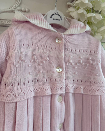 Sarah Louise Adeline pink double knit girls coat with hood, embroidered detailing, button fastening and pleated skirt.