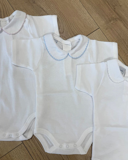 Babidu white unisex baby bodysuit with Peter Pan collar and coloured stitch trim.