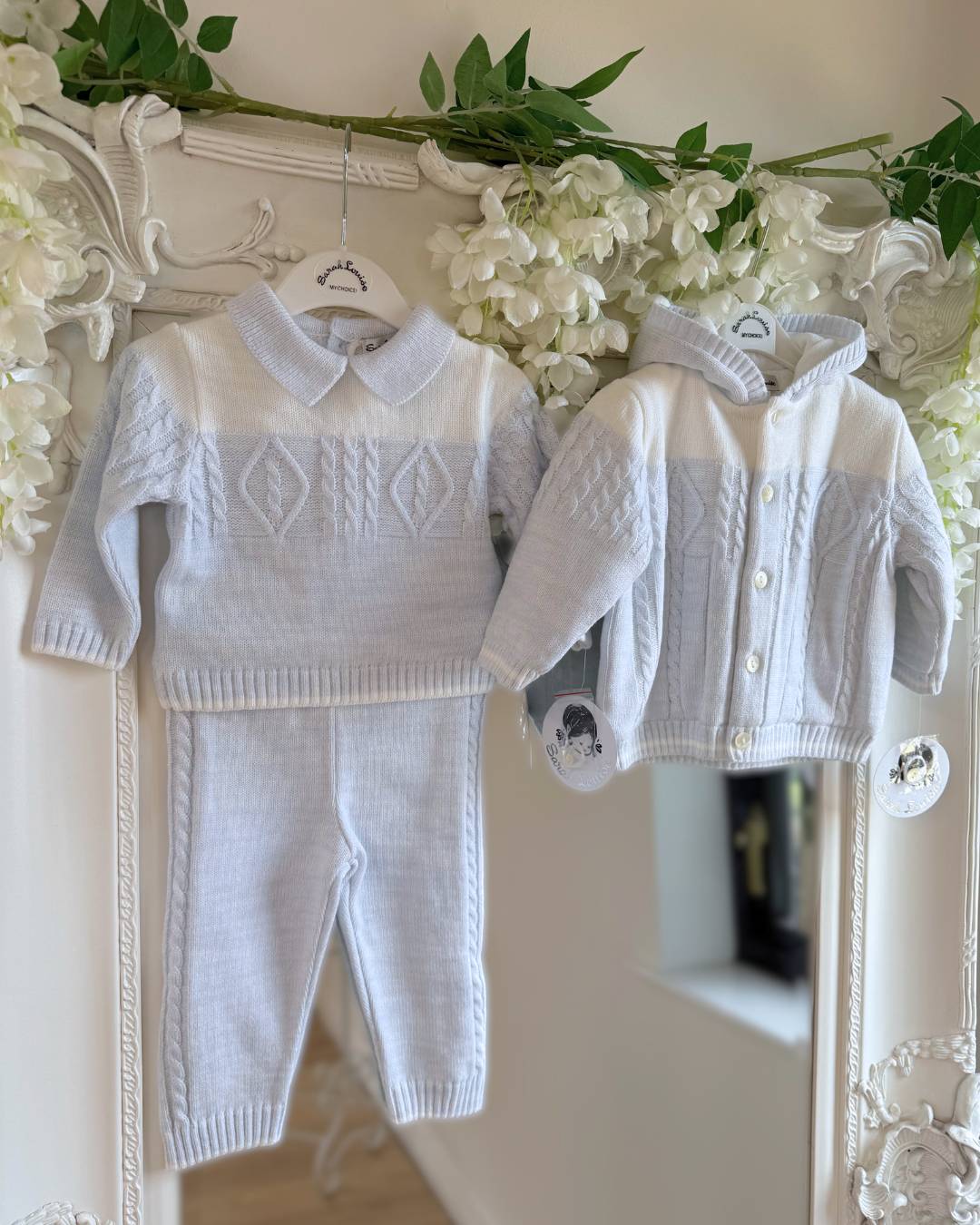 Sarah Louise Alfie baby blue and ivory boys knitted hooded coat with cable knit detailing.