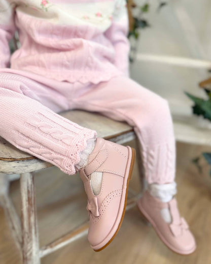 Sarah Louise Madelyn pink knitted girls trouser set with white Peter Pan collar, floral embroidery and cable knit detailing.