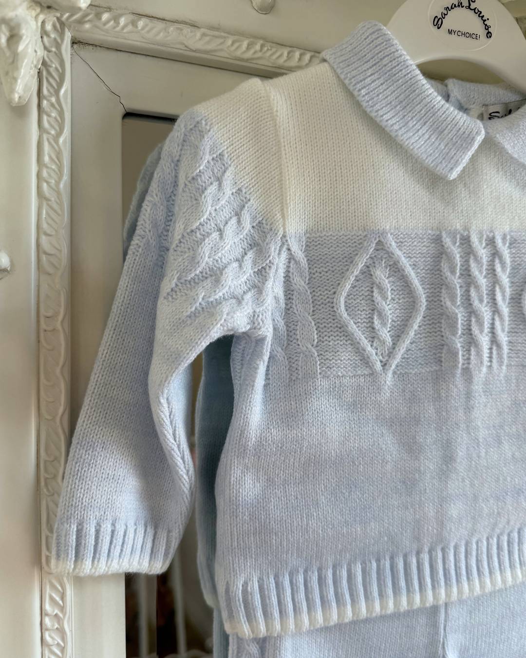 Sarah Louise Alfie baby blue and ivory boys knitted trouser set with cable knit detailing and collar.