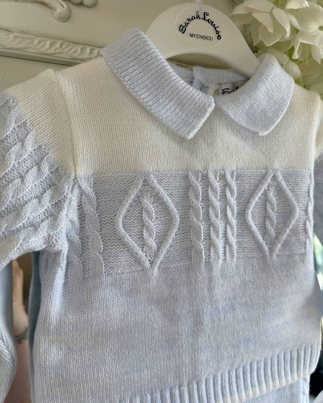 Sarah Louise Alfie baby blue and ivory boys knitted trouser set with cable knit detailing and collar.