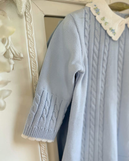 Sarah Louise Aster baby blue girls knitted dress with cable knit detailing, white scalloped floral embroidered collar and bow.