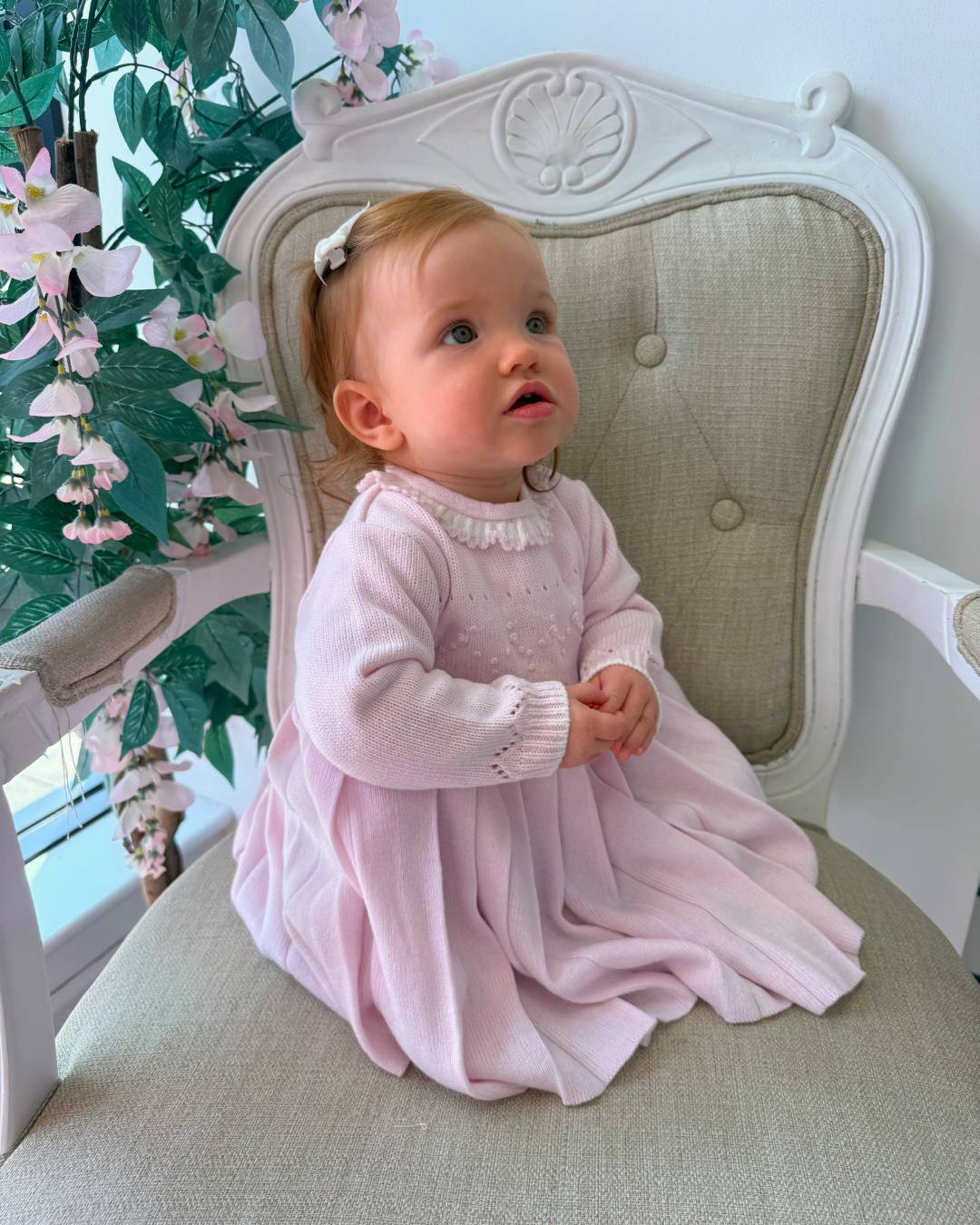 Sarah Louise Adeline pink knitted girls dress with ivory frill collar, hand embroidered roses and pleated skirt.
