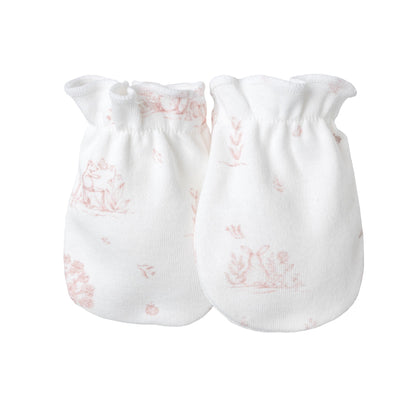 Calamaro Mon Cheri four-piece newborn baby gift set in ivory with pink or blue woodland print, featuring a wrap top, footed trousers, matching hat and scratch mittens.