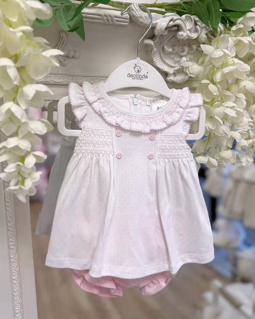 Deolinda Confetti Pink Jampant Set featuring pink jampant shorts, white frill-collar top, pink polka dots, smocking and contrast stitch trims.