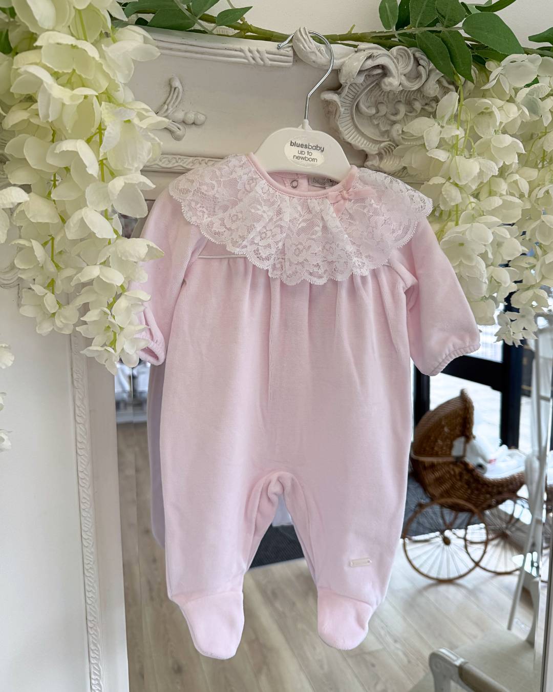 Bluesbaby Elodie Lace Velour Babygrow in baby pink with white lace frill collar, velvet bow and matching pink baby hat.