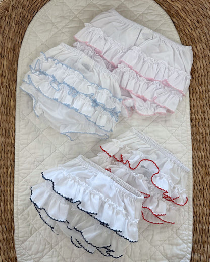 Sarah Louise white baby girls ruffle knickers with layered frill back and contrasting pink, navy or red trim.