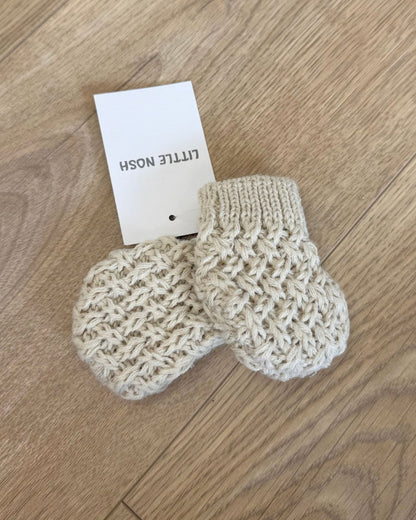 Little Nosh Curly Knit baby mittens in basketweave knit with ribbed cuffs, available in white and biscuit brown.
