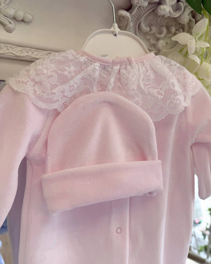 Bluesbaby Elodie Lace Velour Babygrow in baby pink with white lace frill collar, velvet bow and matching pink baby hat.