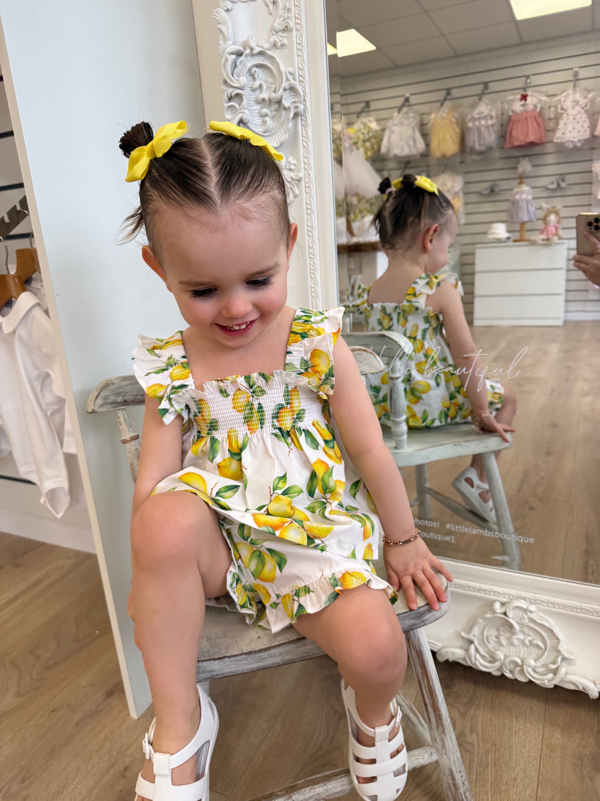 Deolinda Sorrento Short Set featuring a lemon print, stretchy smocked top, frill hem detail and matching shorts for girls.