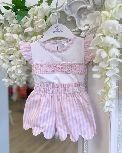 Deolinda California Pink Stripe Short Set featuring a white top with pink smocking, rosebud embroidery, bow detail and pink striped shorts.