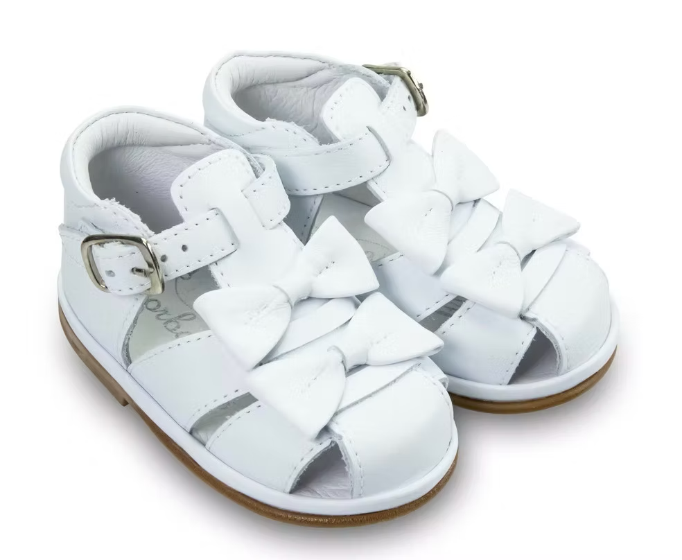 Borboleta Dina Sandals featuring a T-bar design, twin bows, padded collar, cushioned insole and breathable leather lining. Wide G/H fit.