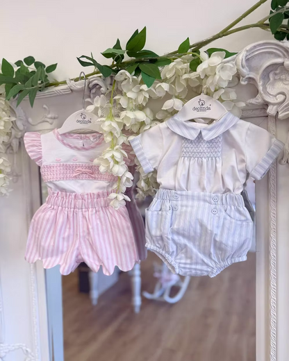 Deolinda California Pink Stripe Short Set featuring a white top with pink smocking, rosebud embroidery, bow detail and pink striped shorts.