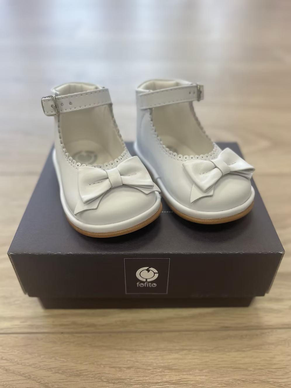 Fofito Ruby Bow Shoes featuring a classic bar shoe design, decorative bow detail, padded collar, cushioned insole and breathable lining.