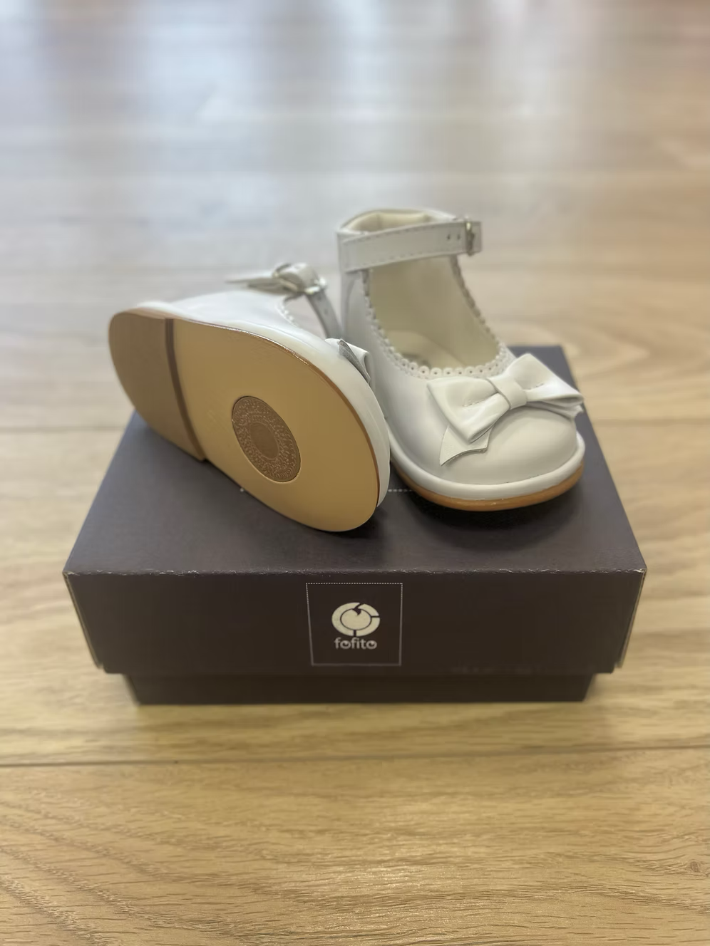 Fofito Ruby Bow Shoes featuring a classic bar shoe design, decorative bow detail, padded collar, cushioned insole and breathable lining.