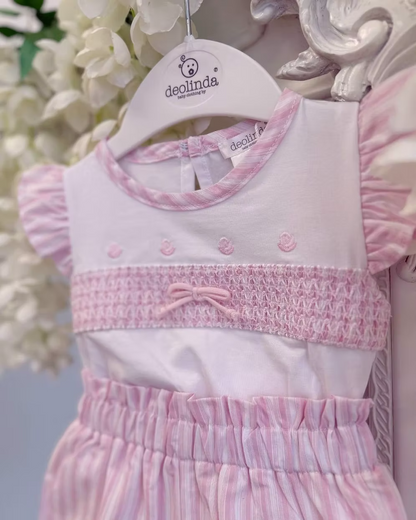 Deolinda California Pink Stripe Short Set featuring a white top with pink smocking, rosebud embroidery, bow detail and pink striped shorts.