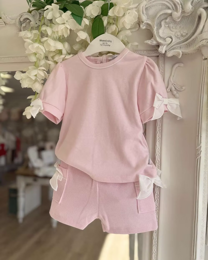 Bluesbaby Pia Pink Bow Short Set featuring a soft pink cotton top with puff sleeves, waffle shorts and contrasting white bow details.