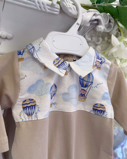 Deolinda Air Balloon Babygrow featuring a hot air balloon and bear print, neutral lower half, Peter Pan collar and popper fastening.