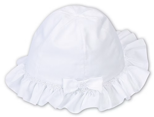 Sarah Louise Girls Sun Hat featuring hand-smocked trim, bow detail and a classic design. Available in white, pink and lemon.
