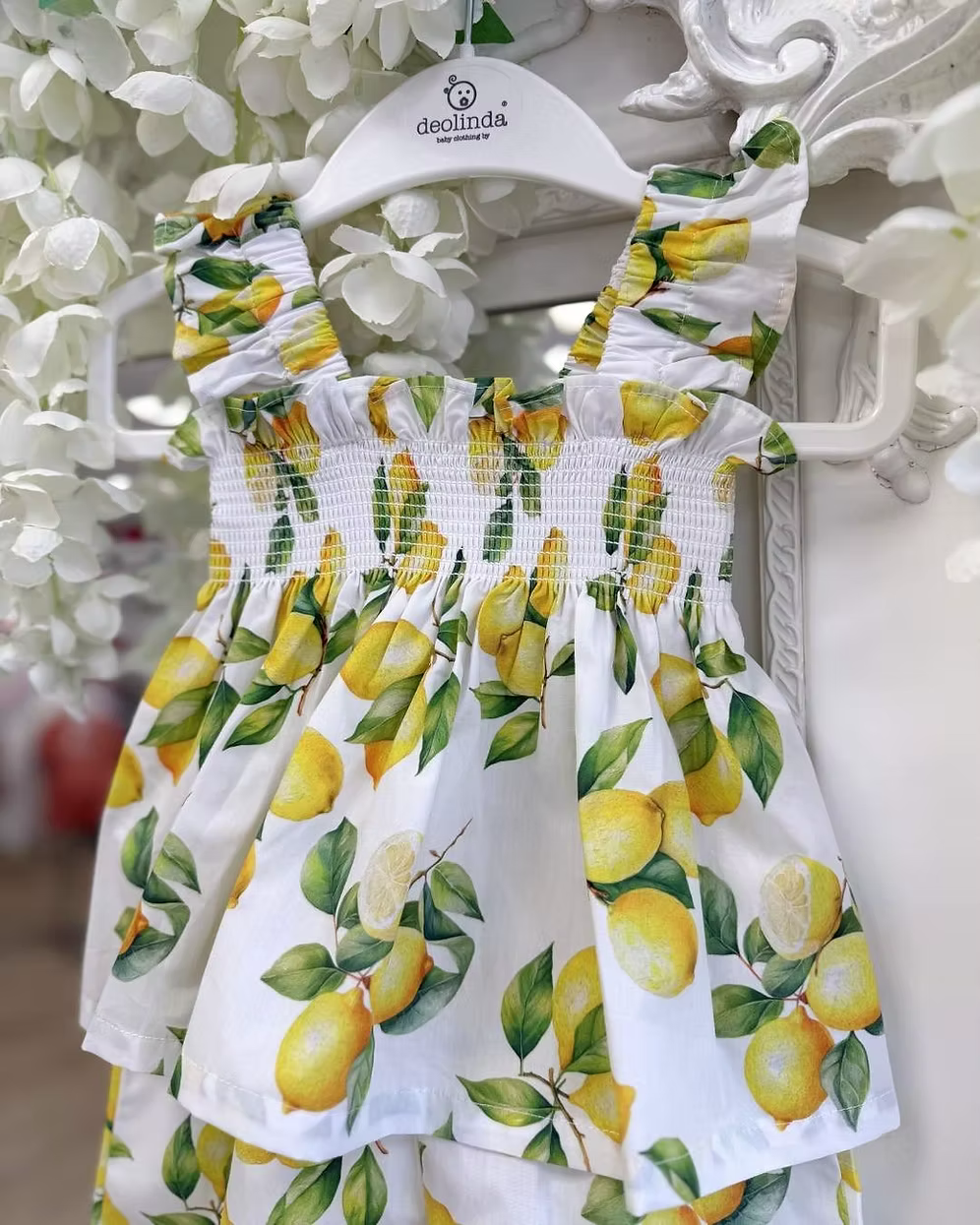 Deolinda Sorrento Short Set featuring a lemon print, stretchy smocked top, frill hem detail and matching shorts for girls.
