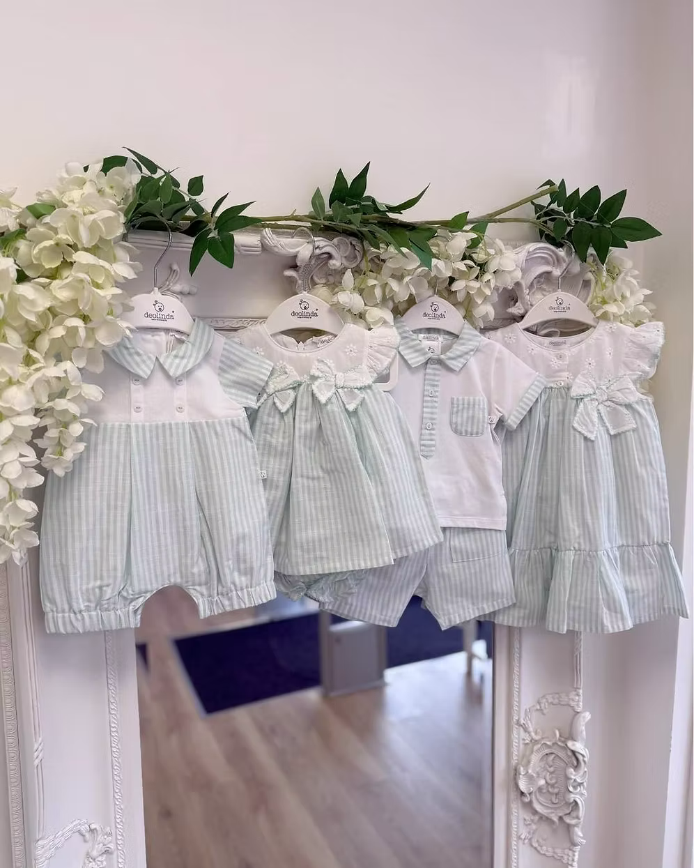 Deolinda Mint Stripe Short Set featuring a white polo top with mint stripe collar, pocket and trims, paired with matching mint striped shorts.