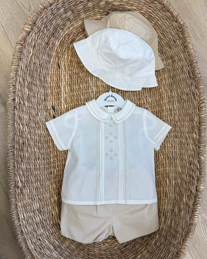 Sarah Louise x Little Lambs Heritage Boys Short Set featuring an ivory shirt with traditional detailing and tailored beige shorts.