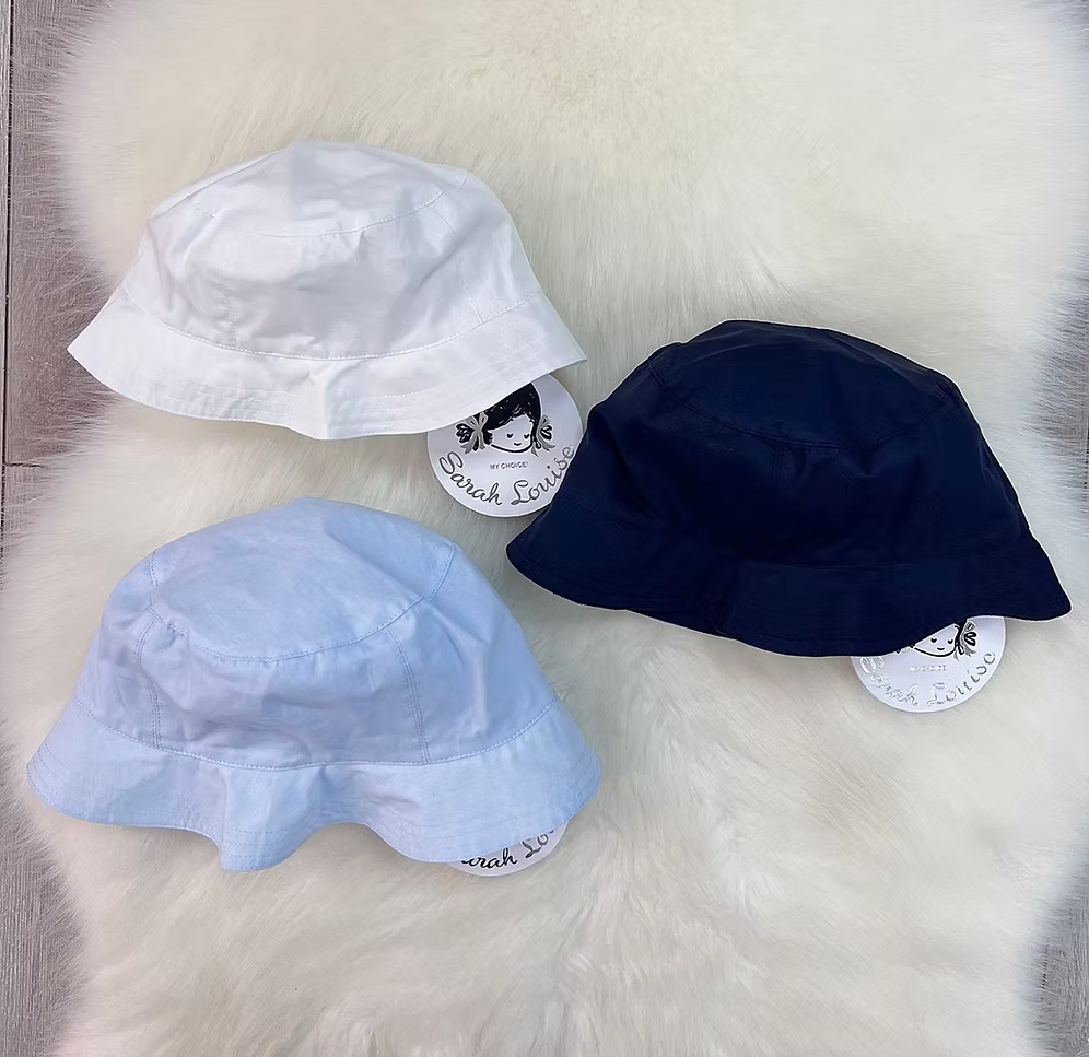 Sarah Louise Bucket Sun Hat featuring a classic bucket style in white, blue or navy. A lightweight summer accessory for boys and girls.