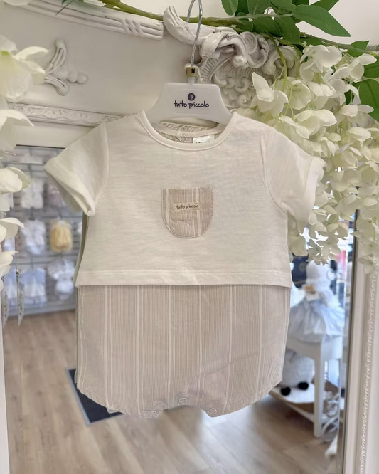 Tutto Piccolo Finn Romper featuring an ivory top, beige striped lower half, chest pocket with embroidered logo and lightweight summer design.